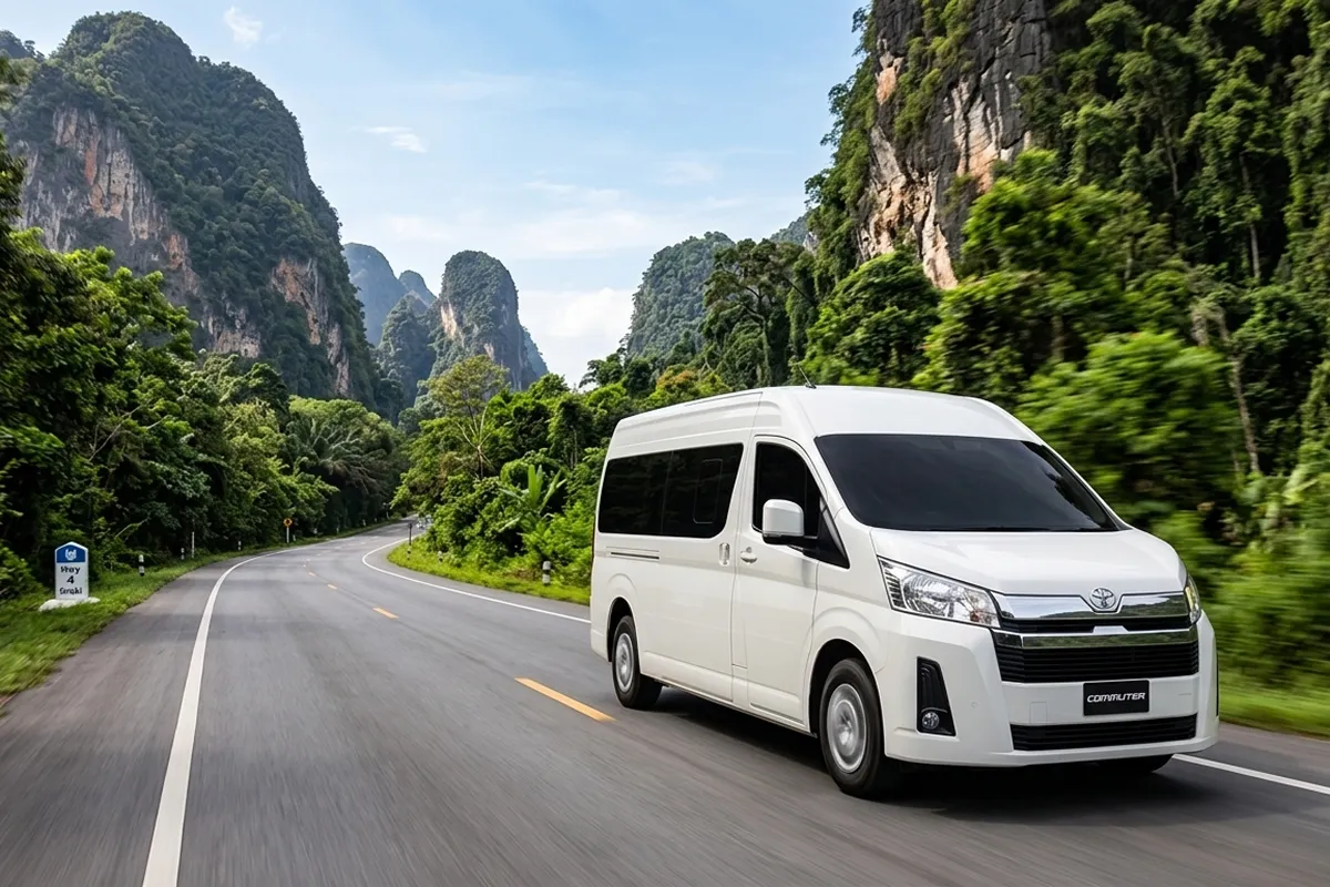 White Toyota Commuter van driving Phuket to Krabi private transfer route