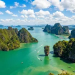 Phang Nga Bay limestone karsts and emerald water in Ao Phang Nga National Park