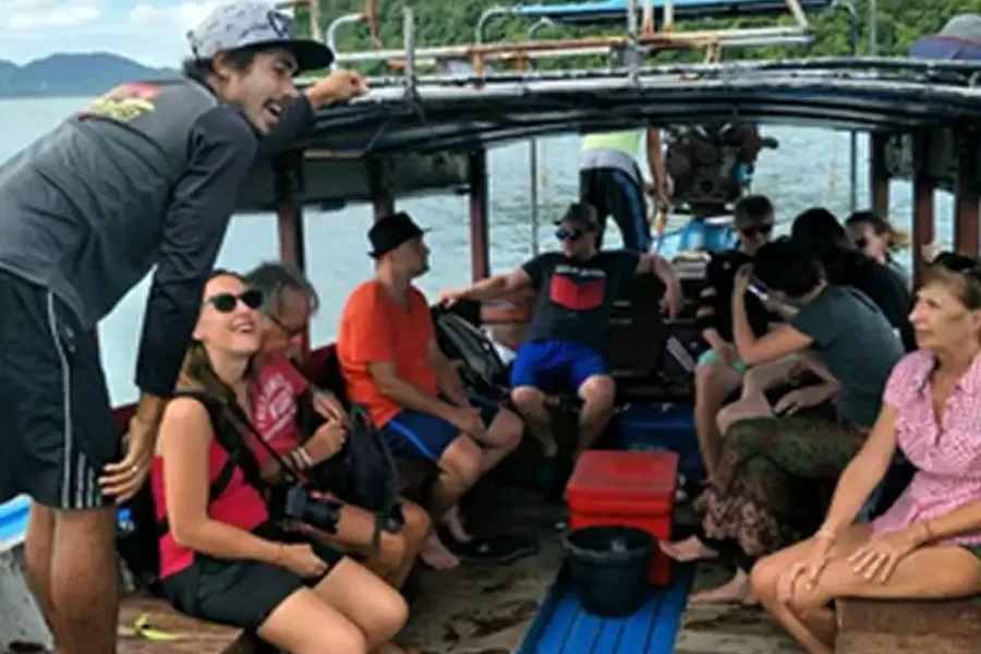 koh lanta 4 islands tour longtail boat tourists on boat cover
