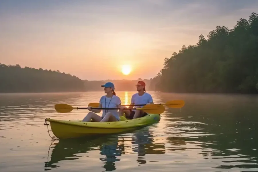lanta sunrise mangrove kayaking couple kayaking at sunrise with fog
