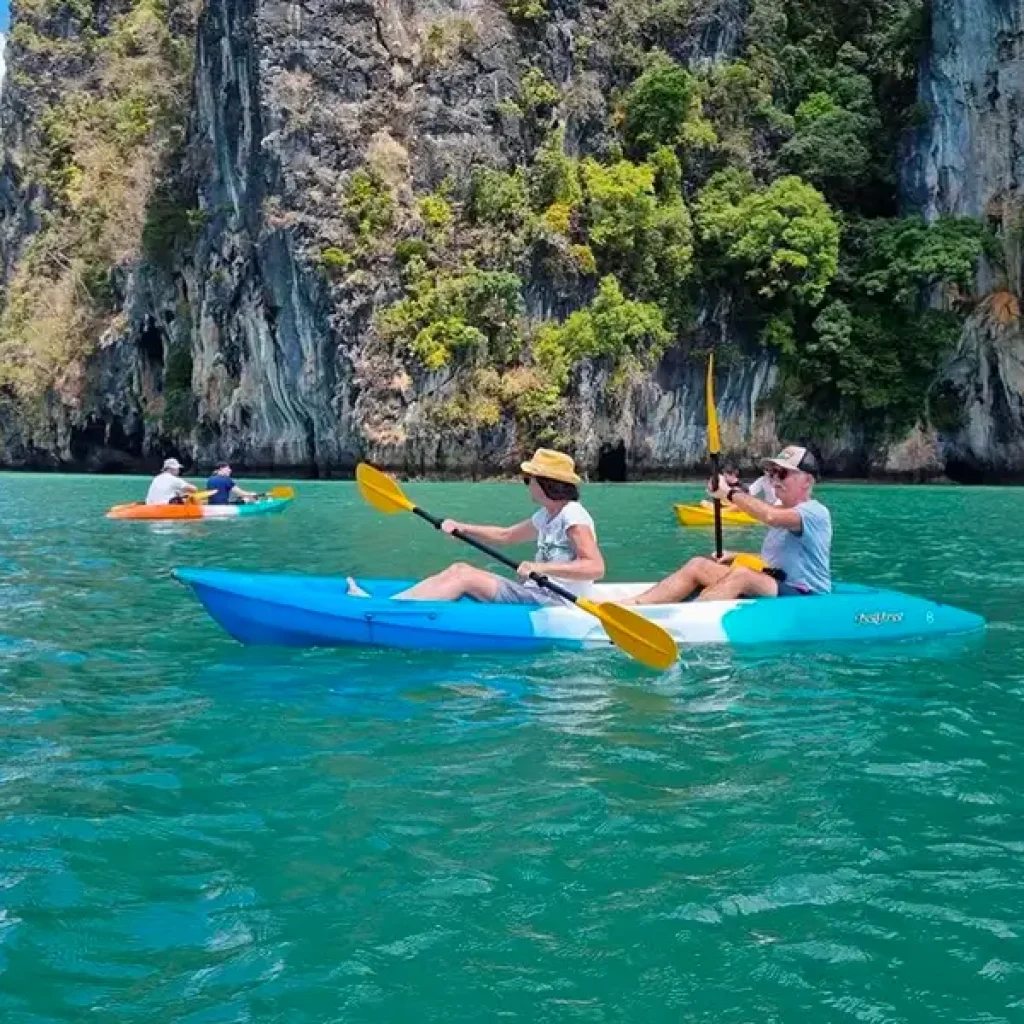 04-sea-kayaking-island-tour-blue-kayak-limestone